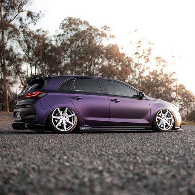 The side of the vehicle is visible, with sunlight shining on the right side.