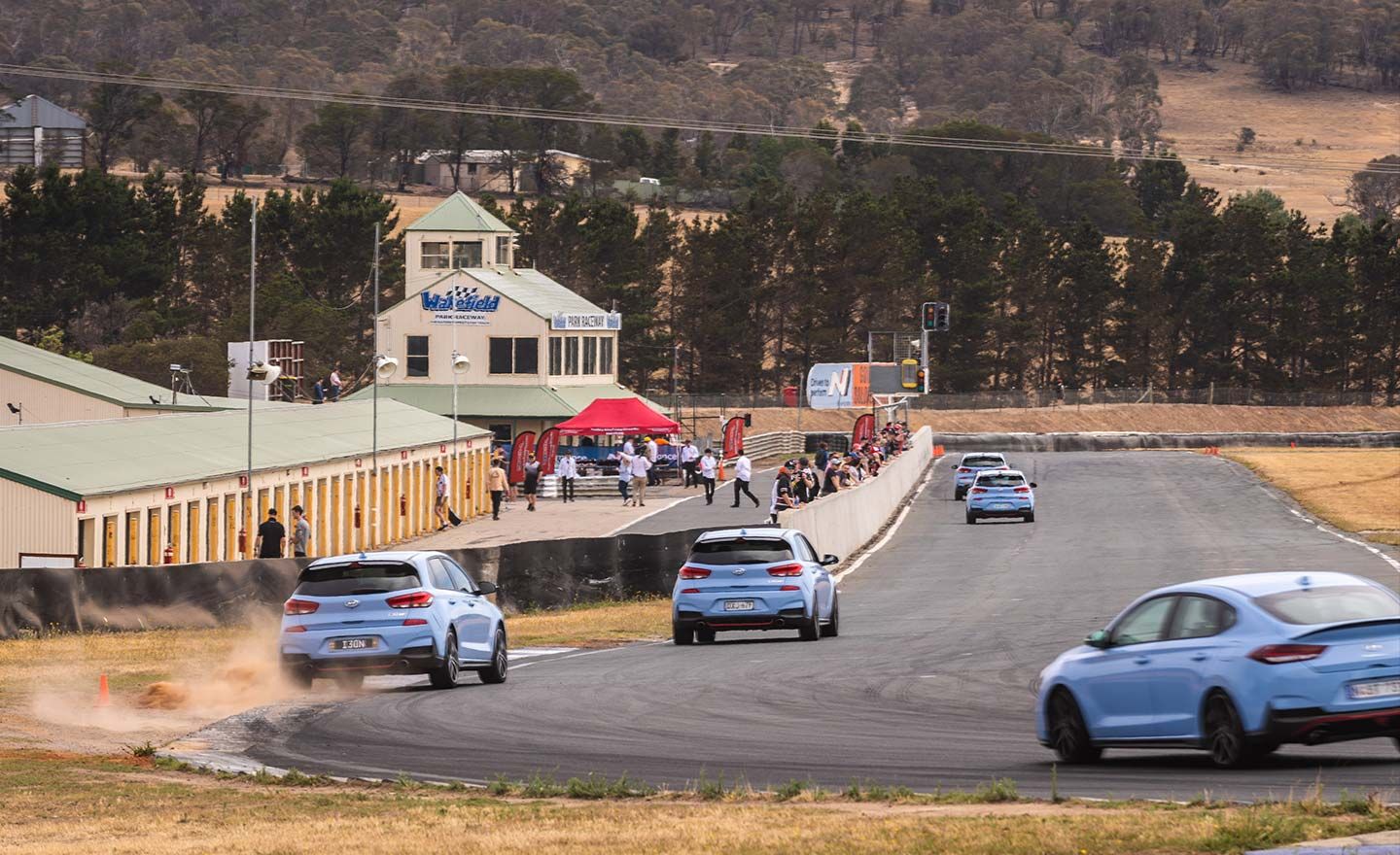 Hyundai N cars driving on the track.