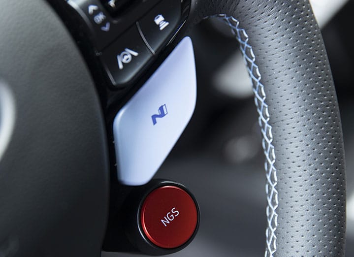 NGS button mounted next to the steering wheel in the Kona N.
