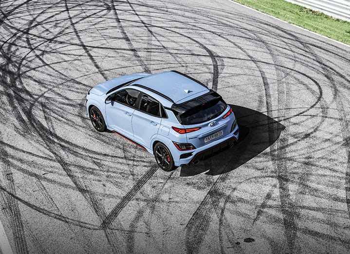 Aerial shot of the parked Kona N and tire marks left on the asphalt.